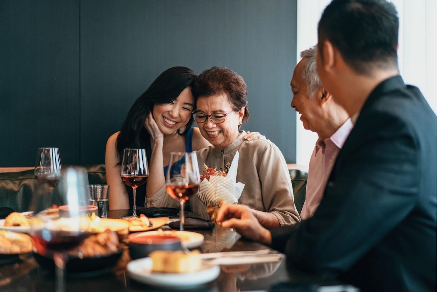 A family sharing dinner together at a local restaurant
